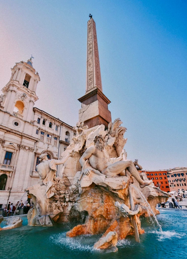 the Four Rivers Fountain by Bernini in the center of the Piazza Navona
