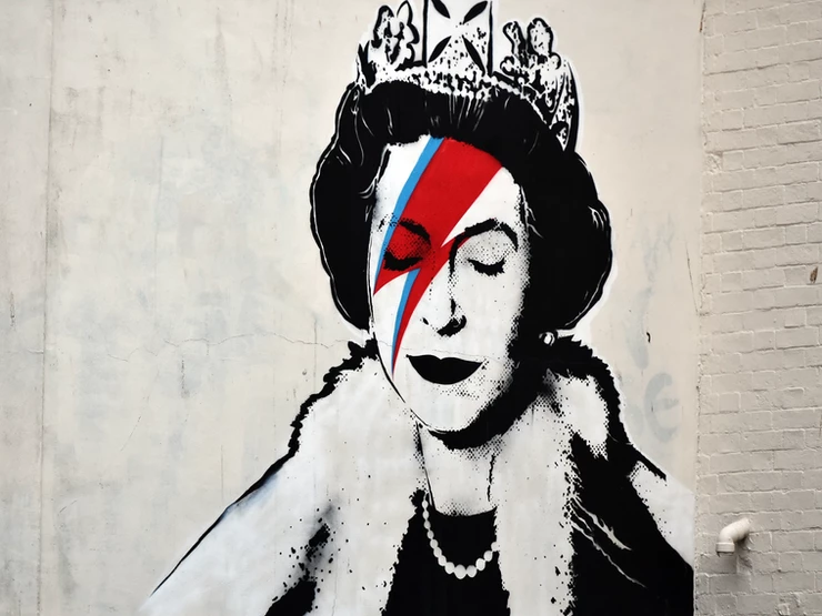 a Banksy piece depicting the Queen as David Bowie in his Ziggy Stardust persona in London