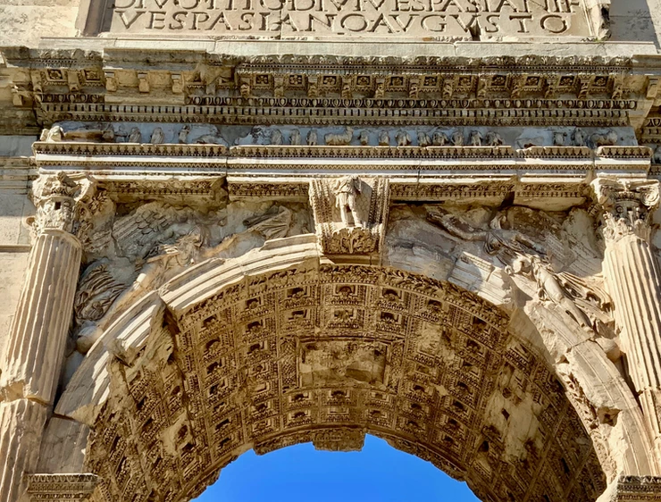 the Arch of Titus, which marks the entrance to the Roman Forum
