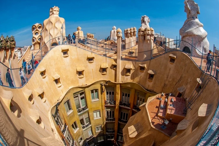 the surreal rooftop of La Pedrera with the whispering windows
