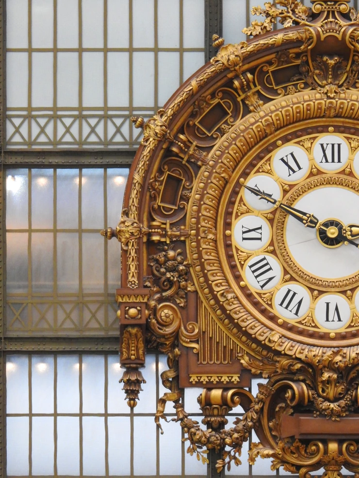 the iconic grand clock of the Musee d'Orsay, a leftover from its previous incarnation as a train station