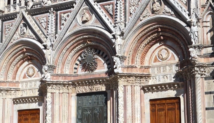 the three portals on the facade of Siena cathedral