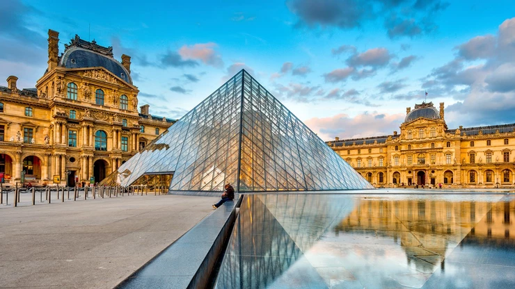 the Louvre Palace and the I.M. Pei Pyramid in Paris France
