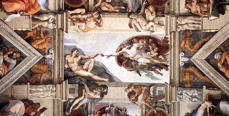 Michelangelo's Creation of Adam in the middle of the Sistine Chapel ceiling