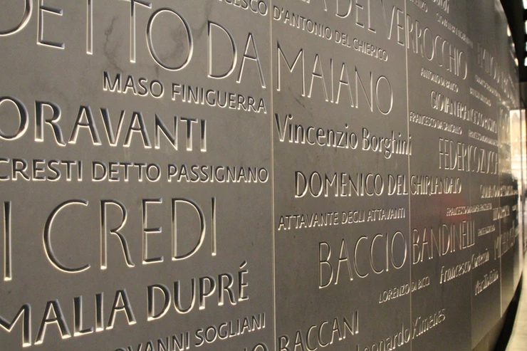 the "Wall of Fame" in the museum, with the names of all artists who worked on the Duomo