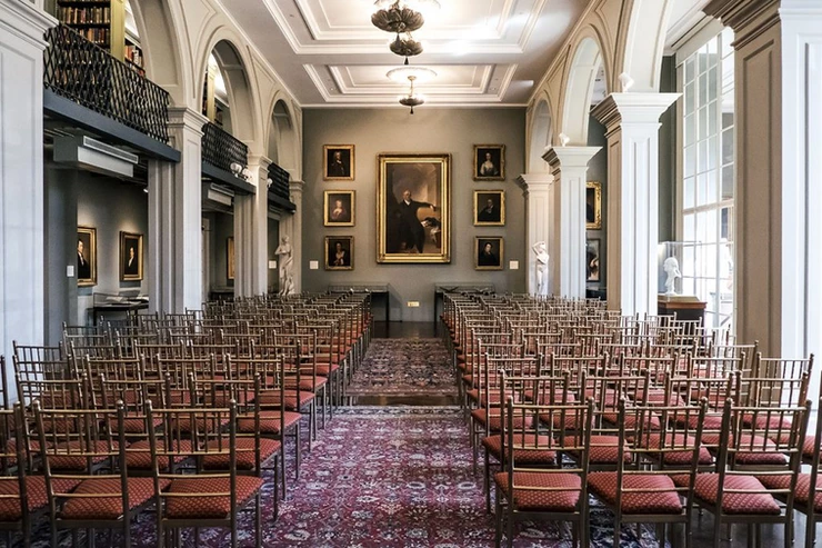 first floor reading room with portraits