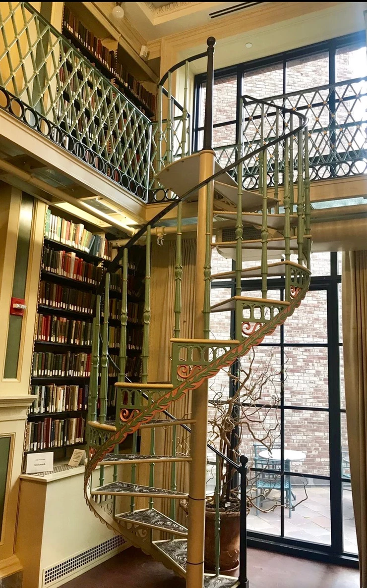 elegant spiral staircase on the second floor
