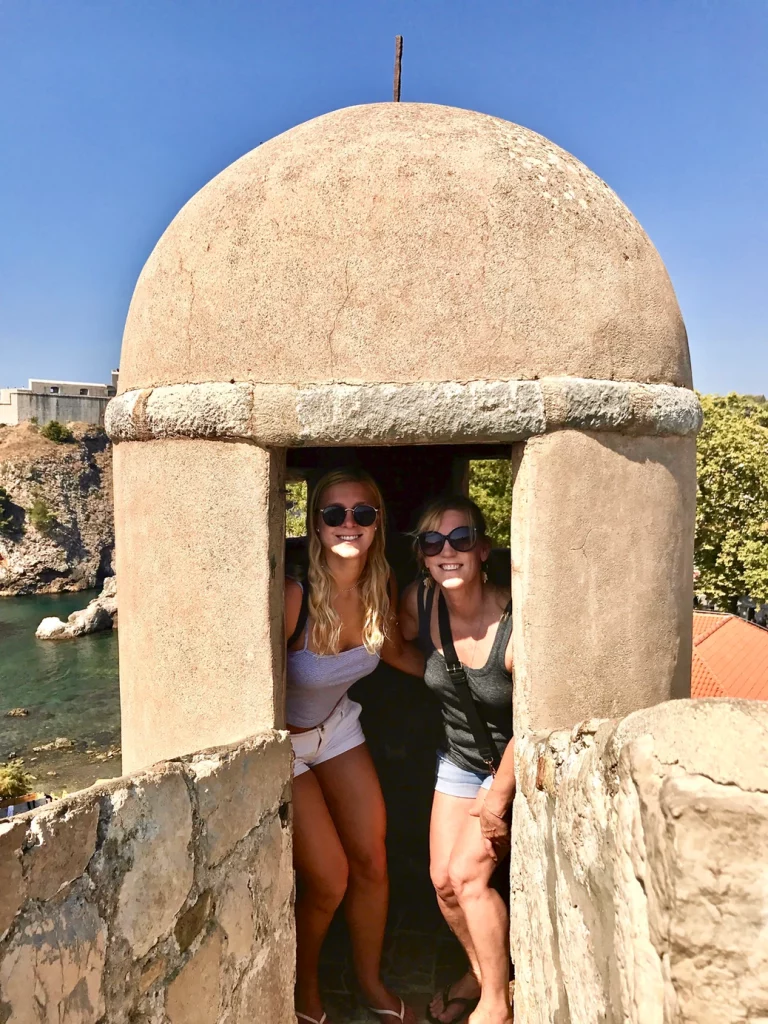 my daughter and I walking the city walls