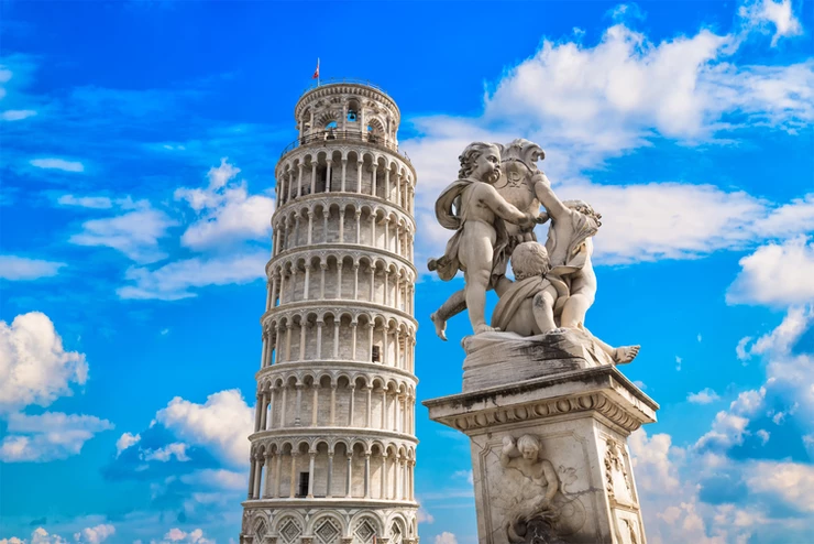 the Leaning Tower of Pisa and the Statue of Angels on Pisa's Field of Miracles