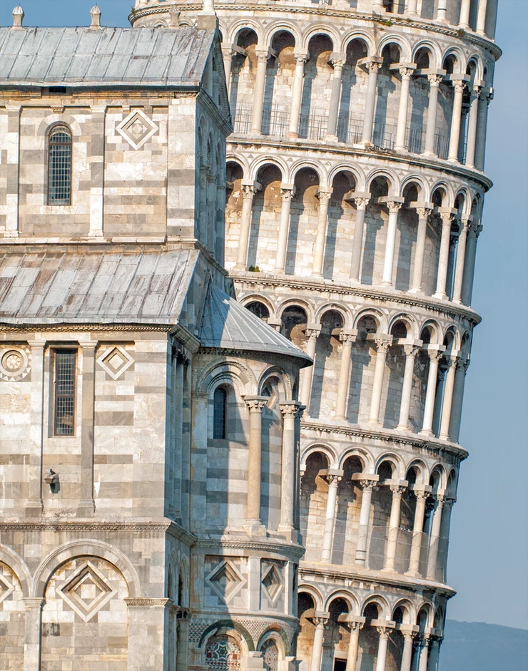 the Leaning Tower of Pisa, peaking out from the right side of the Duomo