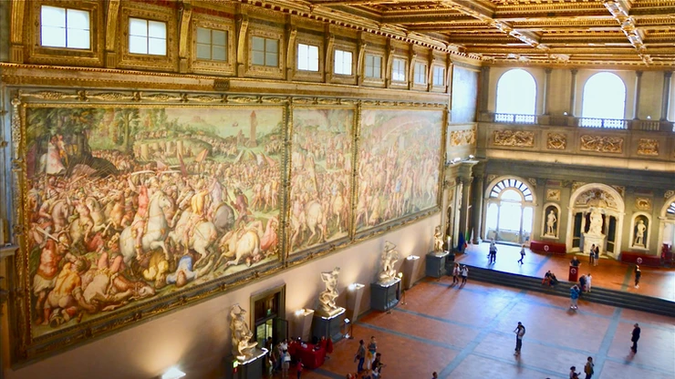 Hall of the Five Hundred in the Palazzo Vecchio -- is Leonardo's Battle of Anghiari behind them?