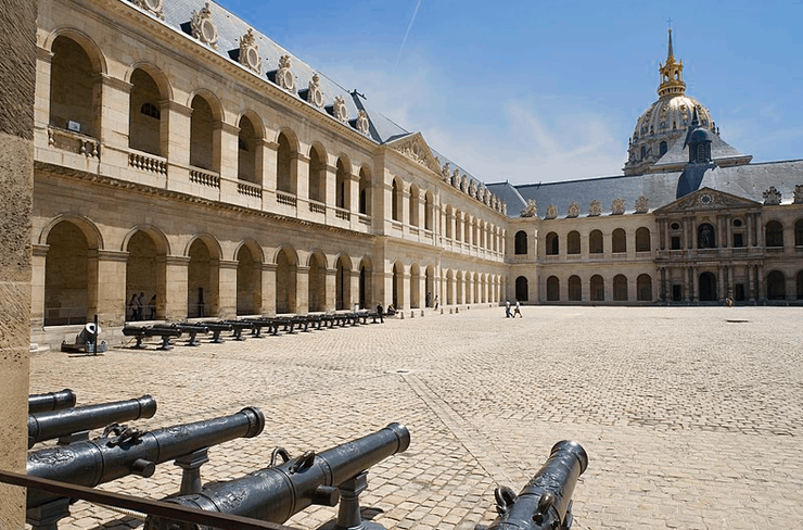 the exterior cobblestone courtyard of Paris' Army Museum, know as the Cour d'honneur