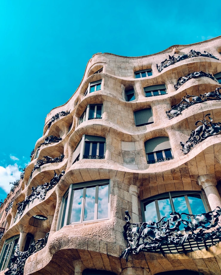 the curvy undulating facade of Gaudi's Casa Mila, a must visit architectural landmark in Barcelona