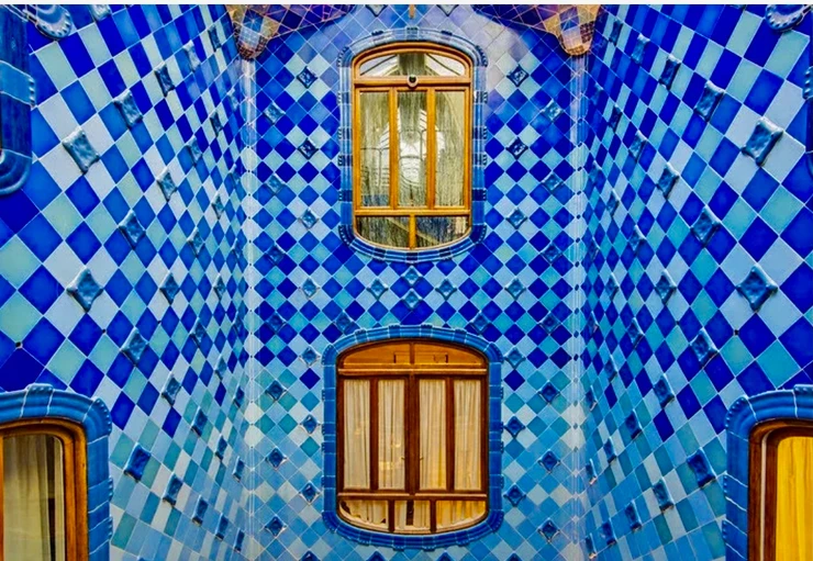 the blue tiled courtyard and atrium of Casa Batllo