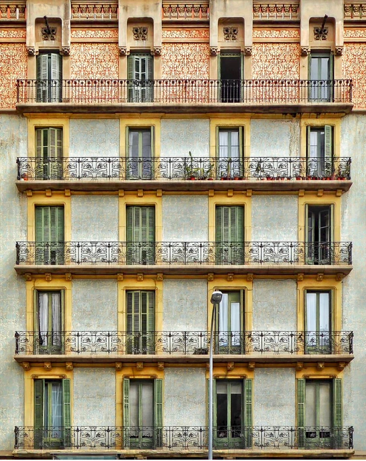 balconied facade of Cases Godo-Lallana