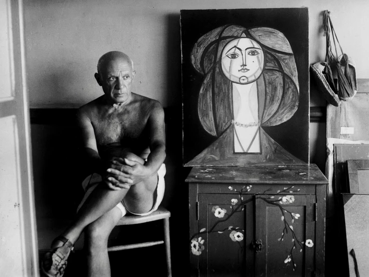 Picasso with a portrait of his lover Francoise