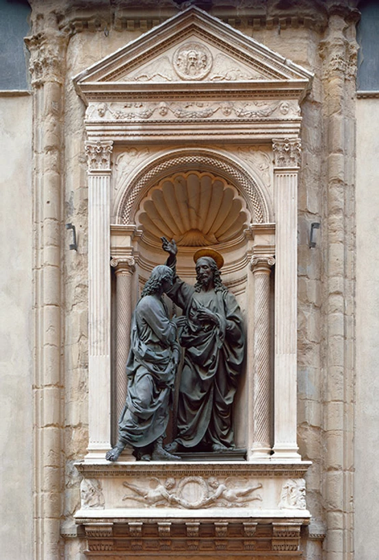 copy of Verrochio's Doubting Thomas in a niche on the exterior of Orsanmichele