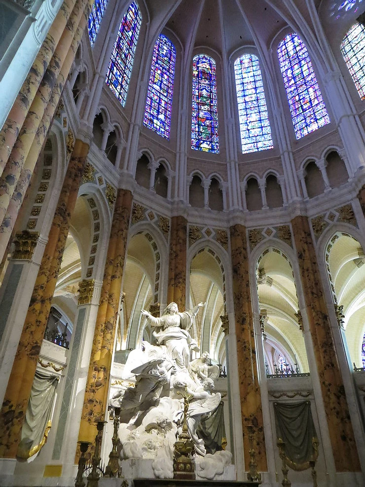 the marble Assumption sculpture, which adorns the altar