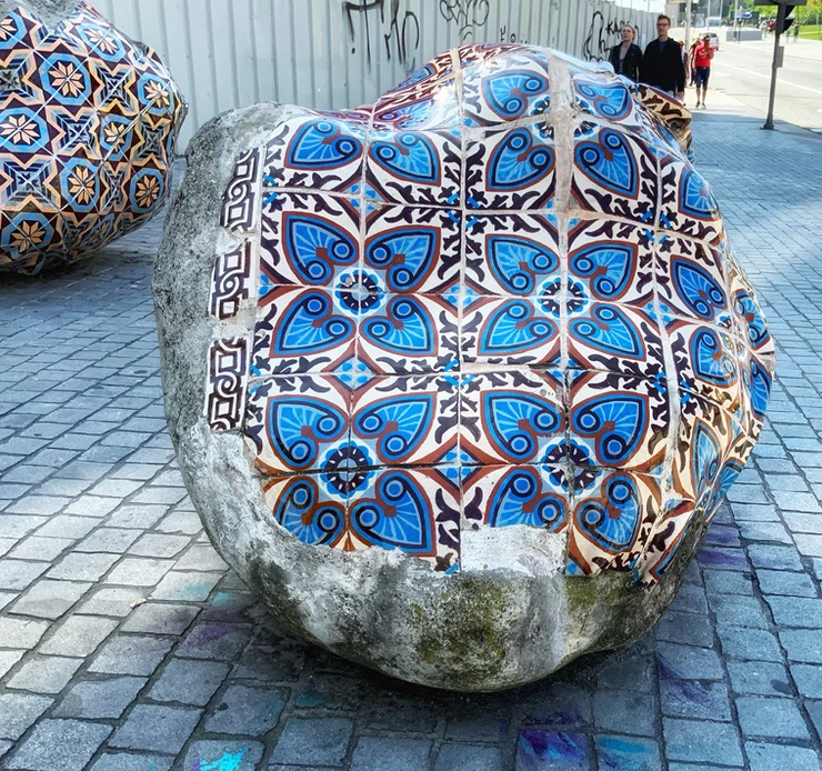 azulejos on boulders outside Sao Bento train station in Porto