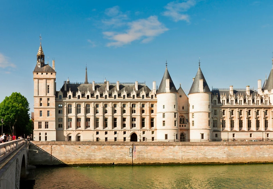 the Conciergerie, stretched along  the Seine River, is a must see hidden gem in Paris