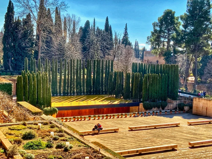the cypress lined stage of the theater of the Generalife Gardens