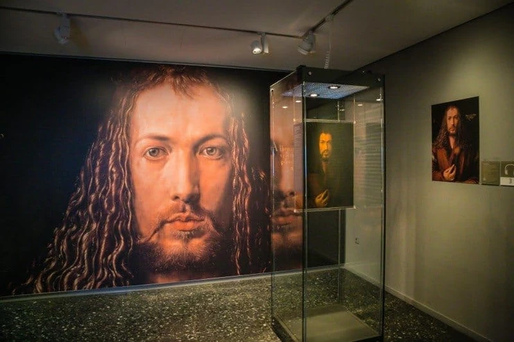 a massive enlargement of Durer's famous Self-Portrait -- psychological study or imitation of Christ?