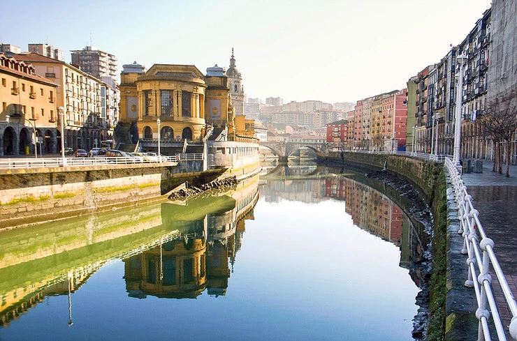The Ribera market perched on the Nervion River in Bilbao, an underrated small city ini Europe