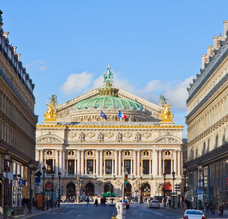 the glamorous facade of the Paris Opera house, a must see site in Paris' 9th arrondissement