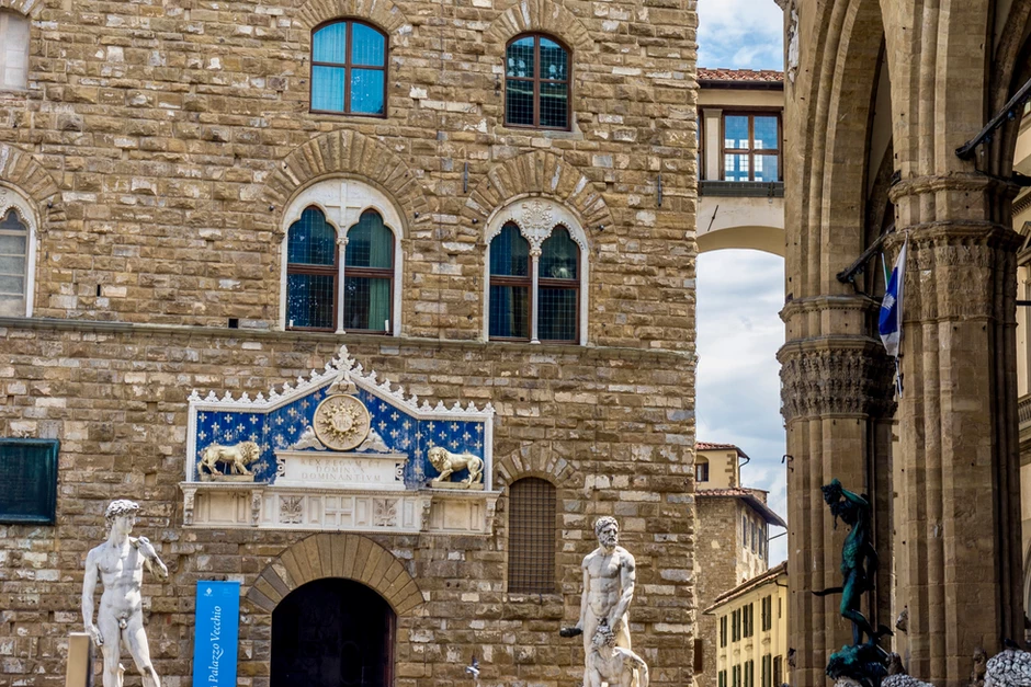 the entrance of the Palazzo Vecchio, with statues of David, Hercules, and Perseus standing guard 