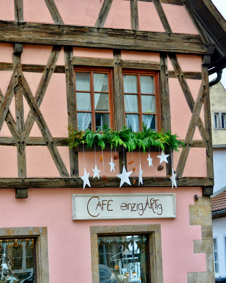 the pretty in pink Cafe Einzigartig, which translates to Cafe Unique