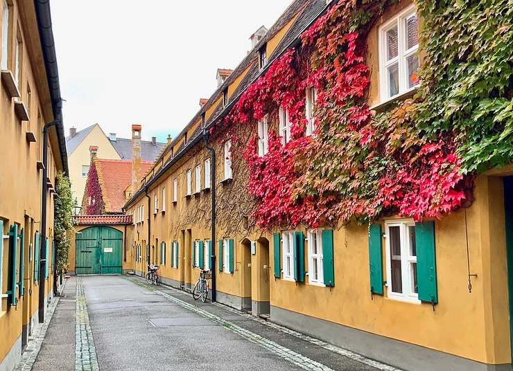 the quaint ivy covered neighborhood of Fuggerei in Augsburg
