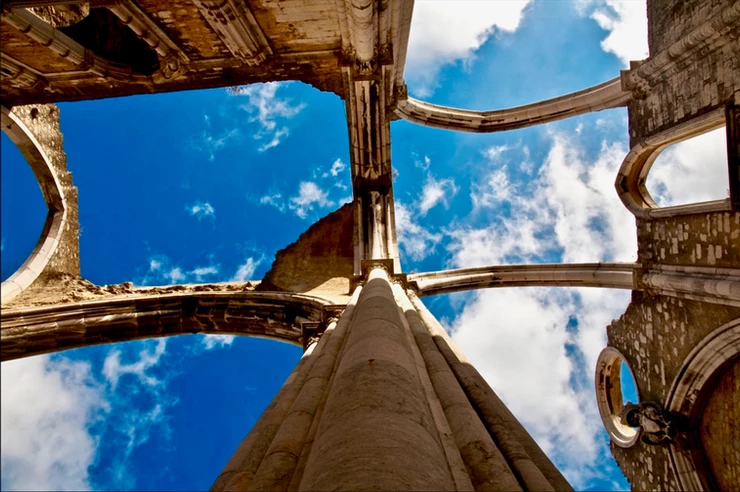 gothic ribbed vaults set against the stark blue sky in the roofless Carmo Convent