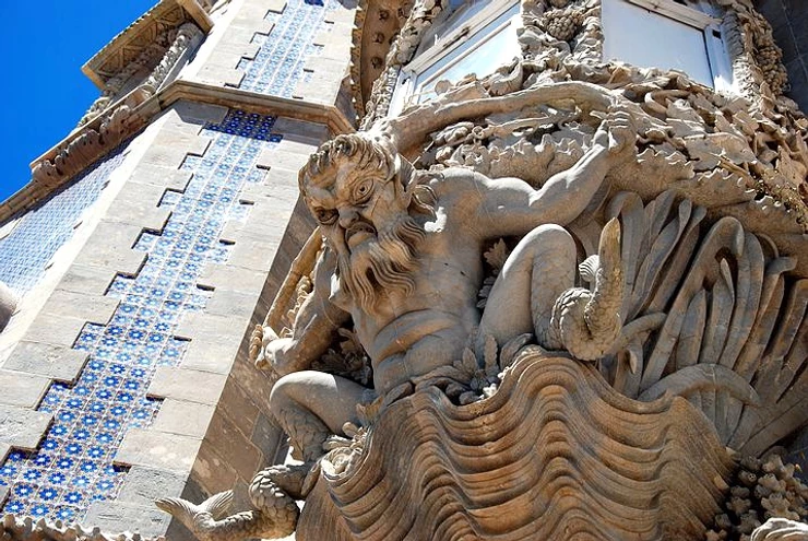 scowling merman on the facade of Pena Palace