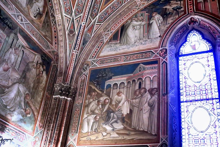 frescos in the church depicting the life of St. Benedict