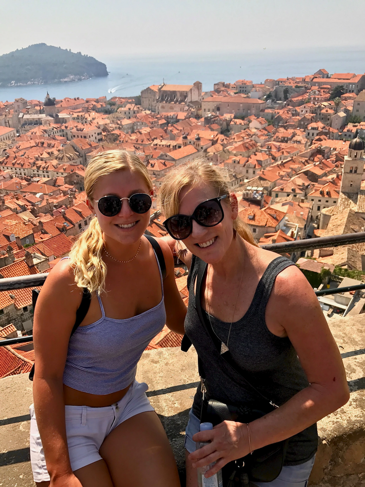 my daughter and I walking the Dubrovnik city walls