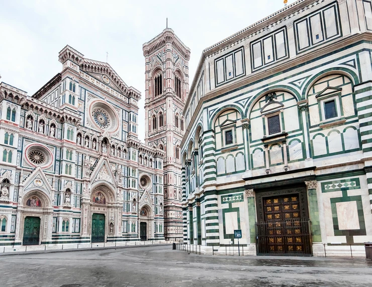 marble facade of the Baptistry (right) in Florence