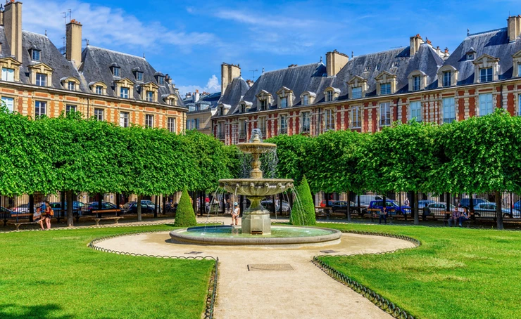 the elegant and classical Place des Vosges in the Marais