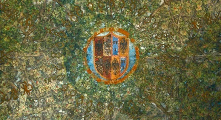 heraldic coat of arms in the center of the ceiling