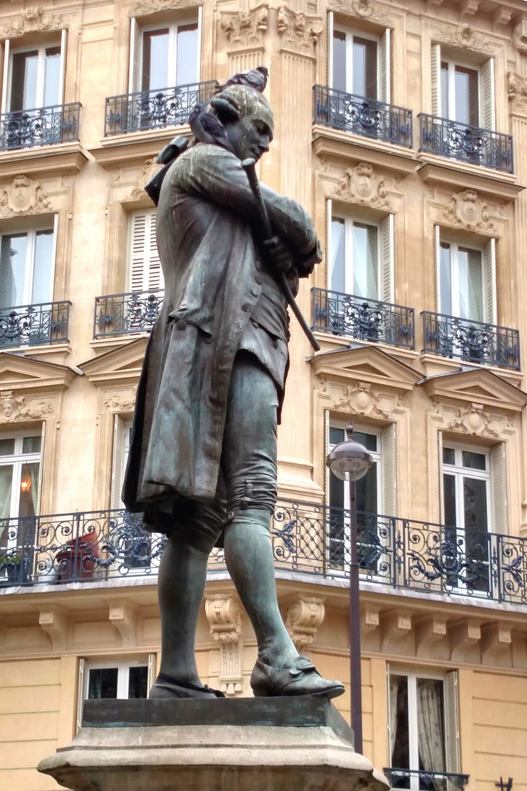 statue of Beaumarchais on Rue de Tournelles in the Marais