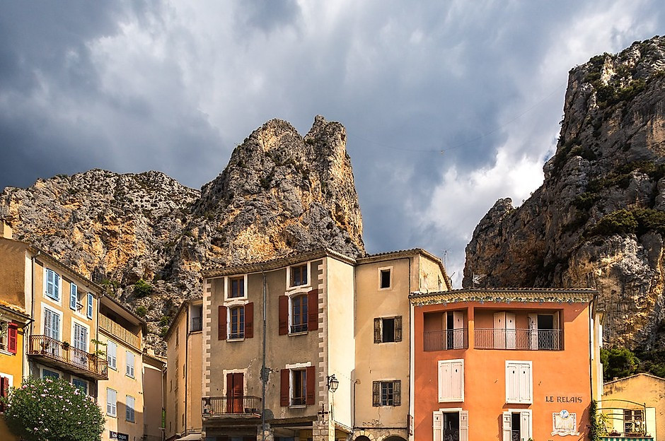 the town of Moustiers-Sainte-Marie-Sainte-Marie, smooshed between two cliffs