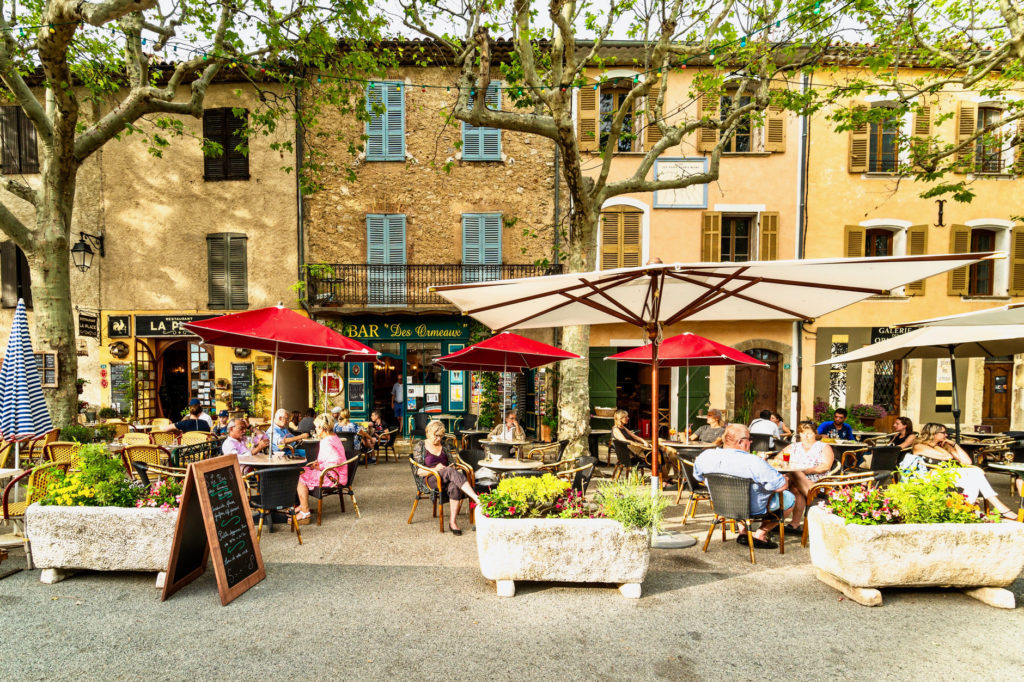 cafes amid Syacmore trees in the beautiful hidden gem of Tourtour in Provence