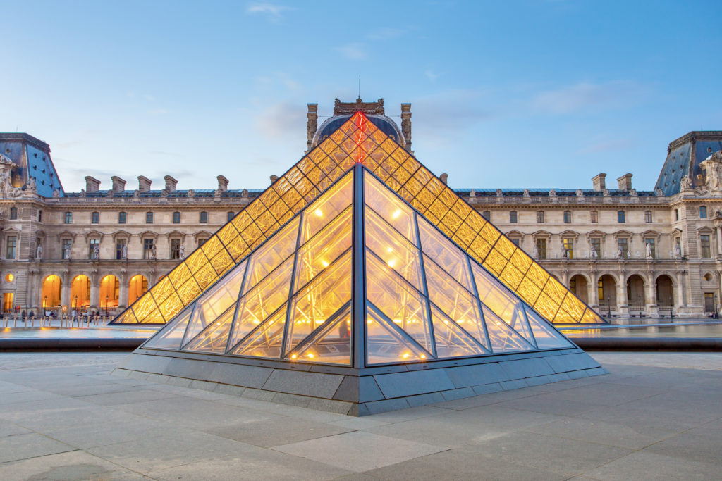 Louvre Museum and the I.M. Pei Pyramid at twilight