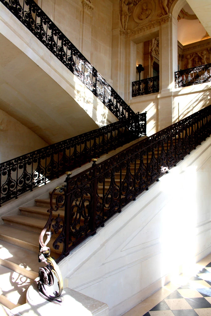 the beautiful limestone interior and wrought iron staircases of Paris' Picasso Museum