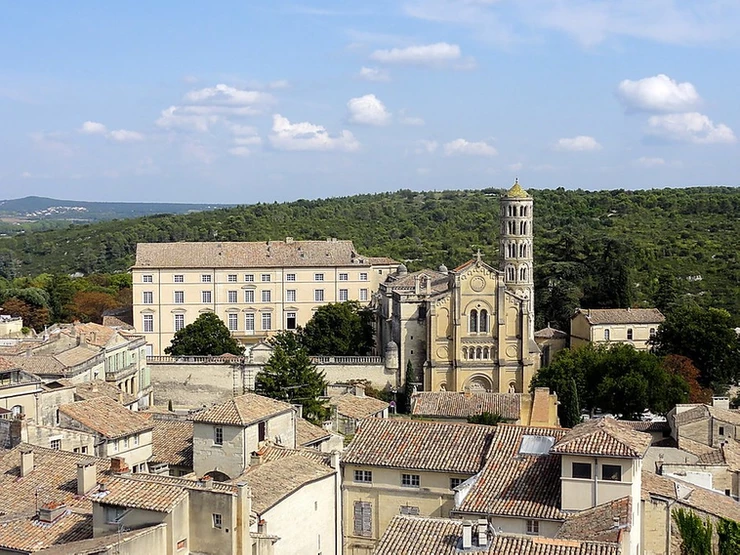 Uzes, a sunshine-y village, wrapped in golden hued limestone, on the border of Provence and Occitanie