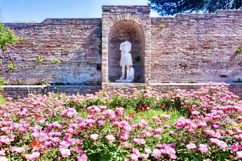 the Domus della Fortuna Annonaria courtyard ruins and Diana statue 