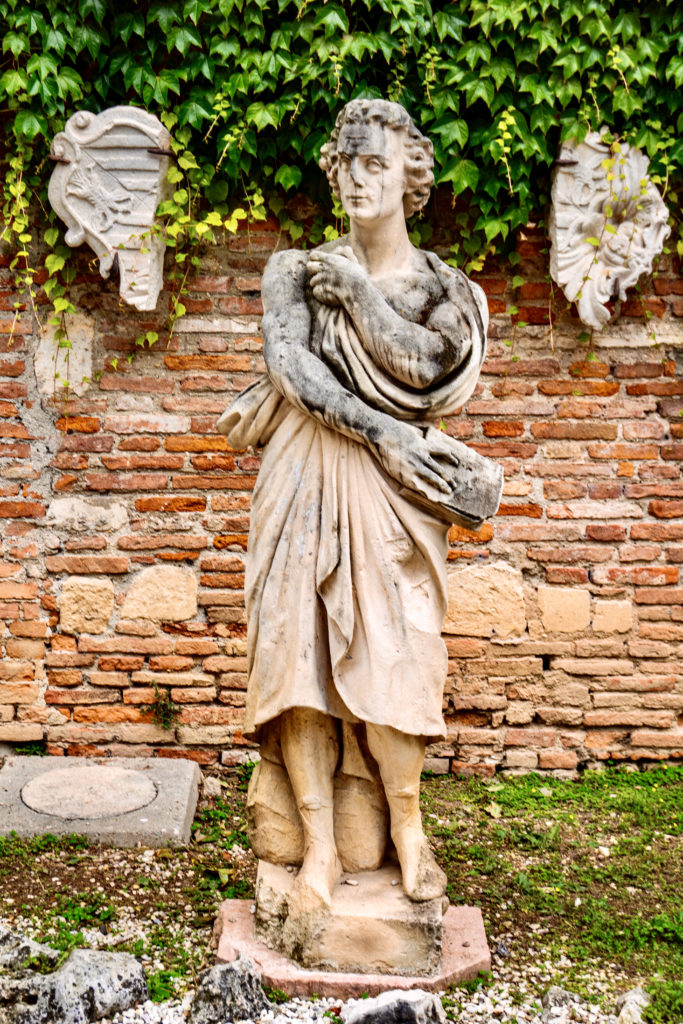 statue in the courtyard of the Olympic Theater