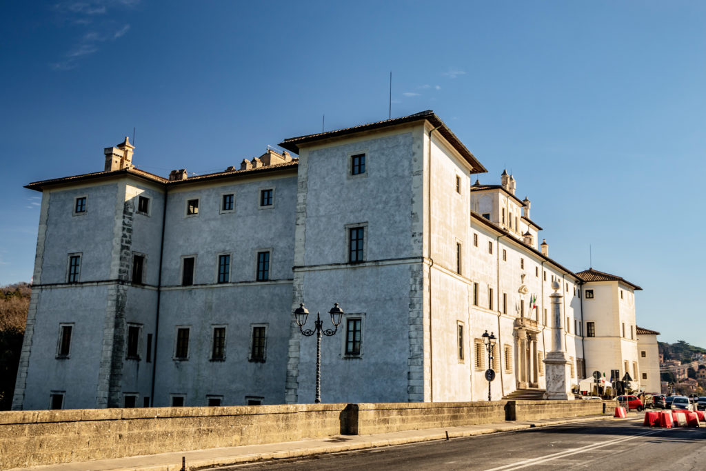 the Baroque Chigi palace in the historic Piazza di Corte 