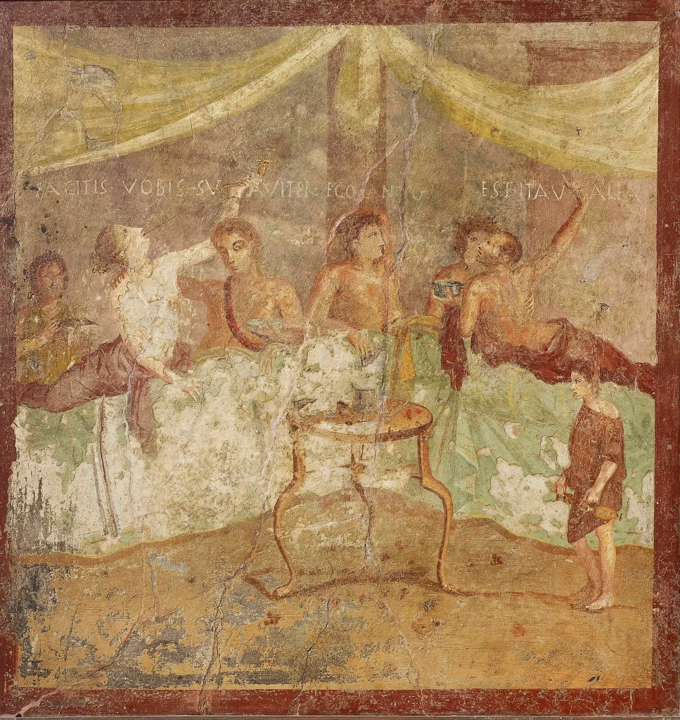 A fresco showing wealthy Romans dining -- Archaeological Museum Naples
