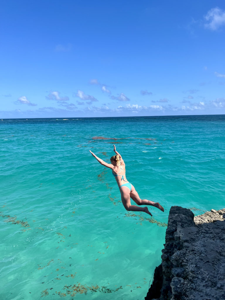 my daughter cliff jumping in Barbados