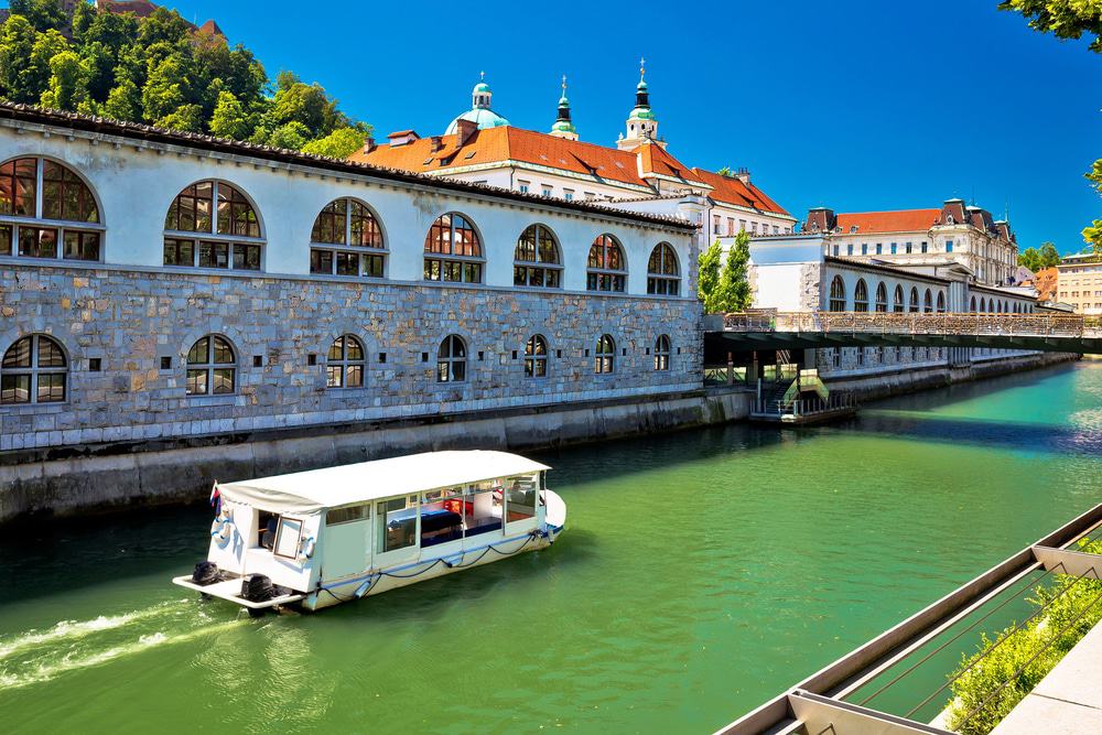 boat cruising down the Ljubljanica River
